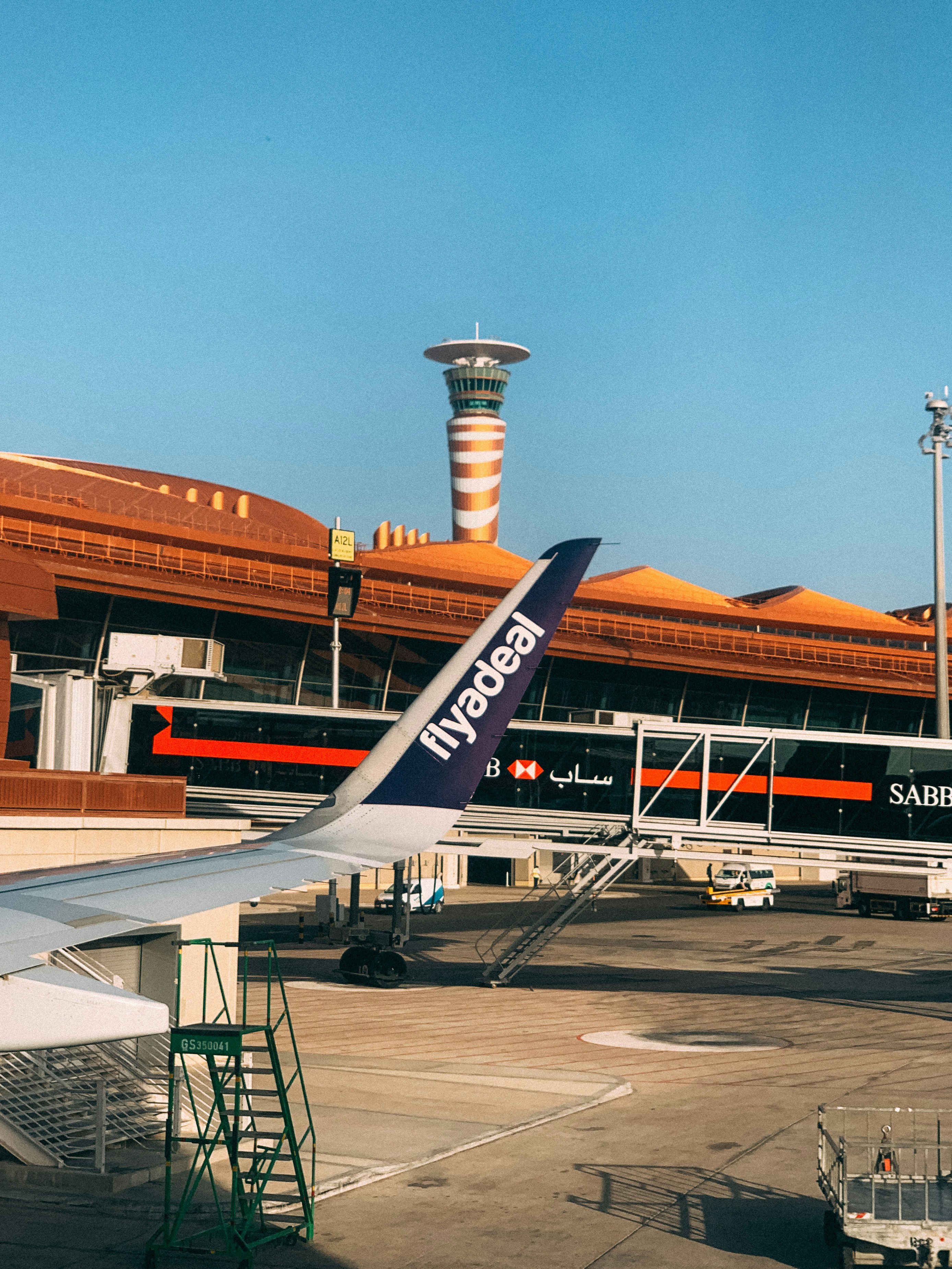 Night lineup of aircraft under runway lights