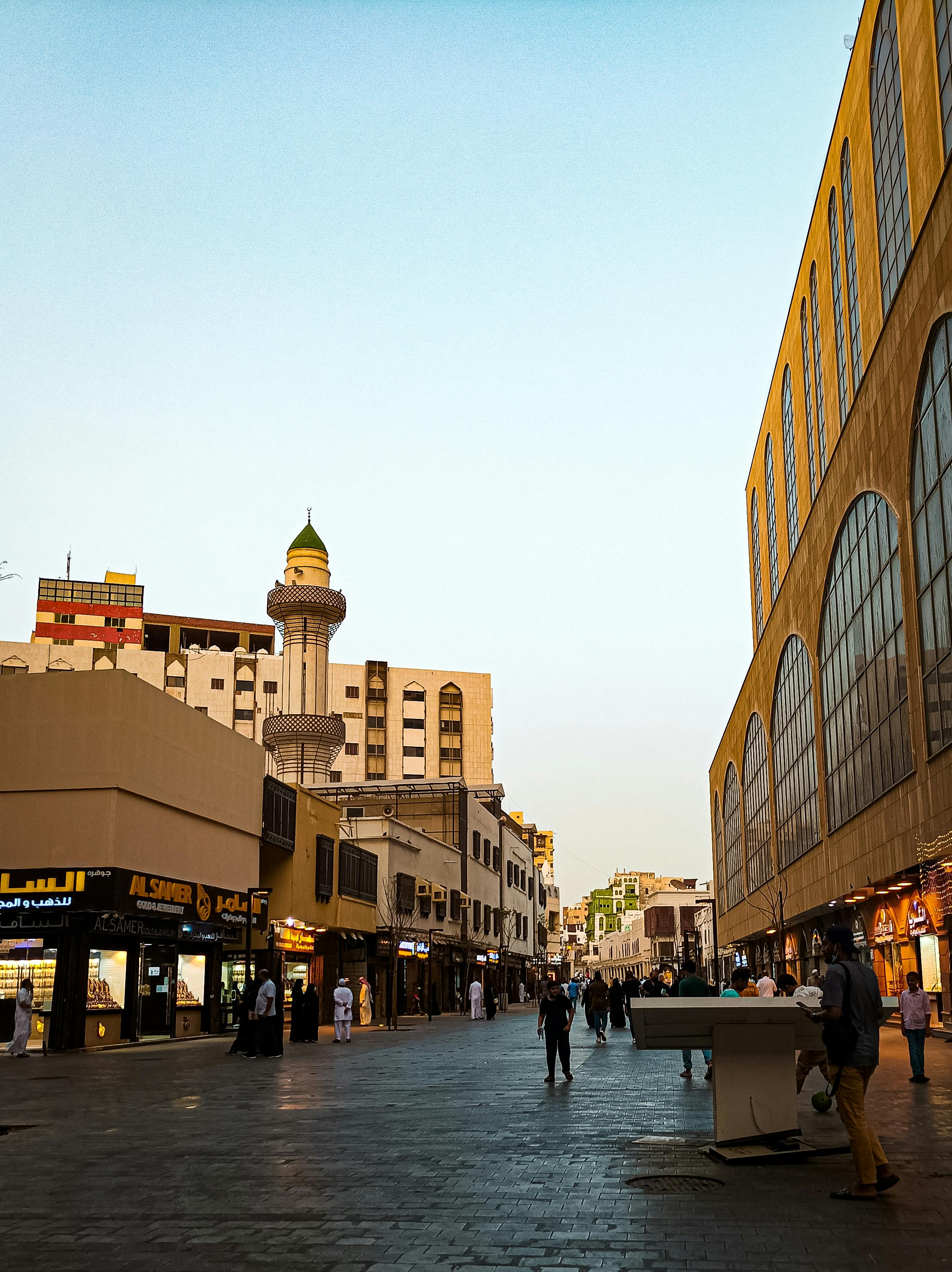 Al‑Balad coral stone houses and palms
